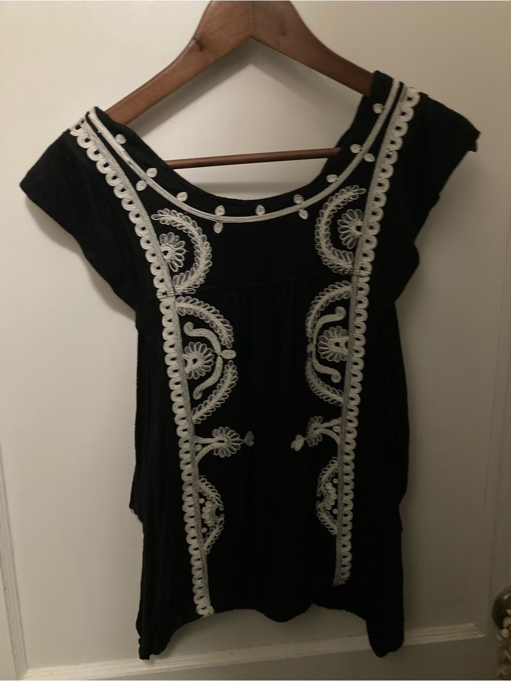Free People EUC Black small top with White Embroidery design